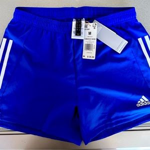 Adidas new with tags never been worn MED size women’s royal blue athletic shorts
